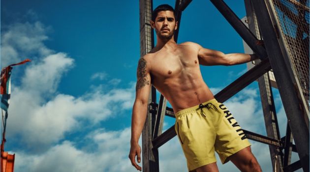 René Grincourt wears summer swimwear from Calvin Klein.