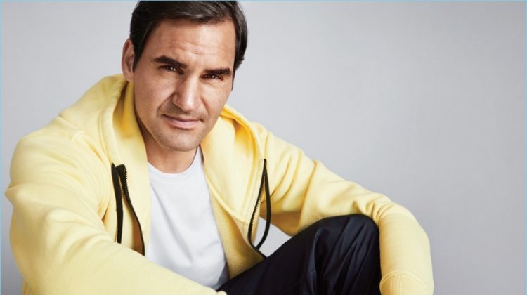 Starring in a photo shoot, Roger Federer wears a Tom Ford sweatshirt, Frame t-shirt, and Nike track pants.