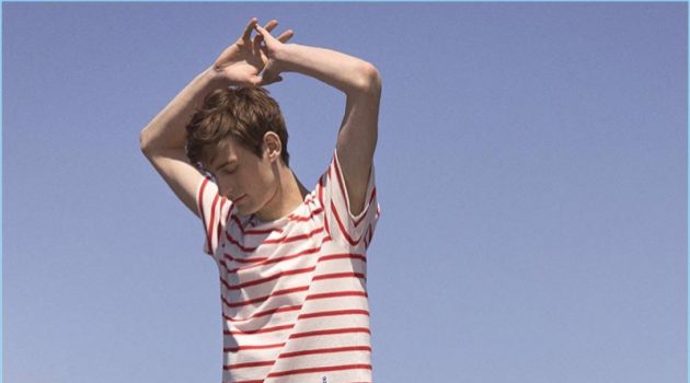 Stretching, Matt Doran wears a Club Monaco striped tee with Baxter shorts.