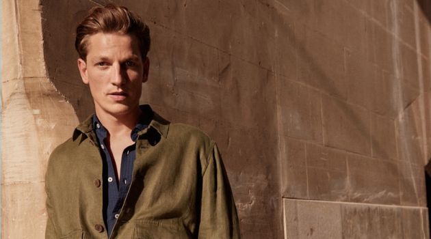 Embracing military style, Hugo Sauzay models a lightweight linen jacket by Mango Man.