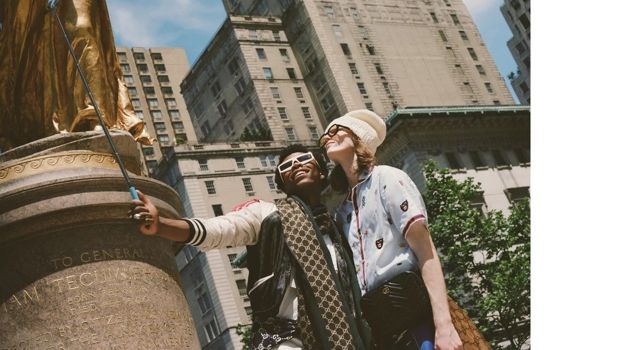 Clad in Gucci, Matt Pitt and Morocco pose for a selfie.