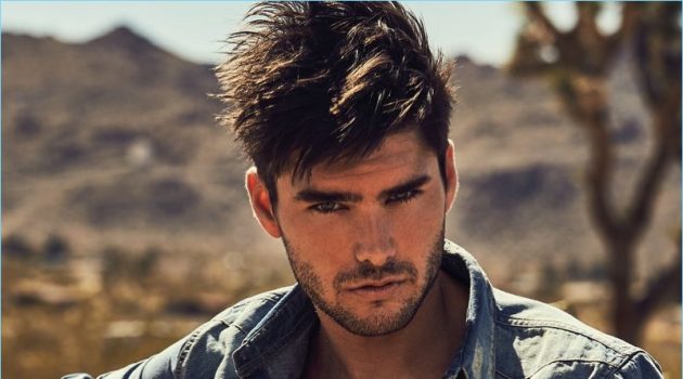 Donning a denim shirt, Charlie Matthews stars in Guess' fall-winter 2018 campaign.