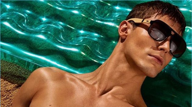 Model Jacob Hankin soaks in the summer sun for Steve Madden's campaign.