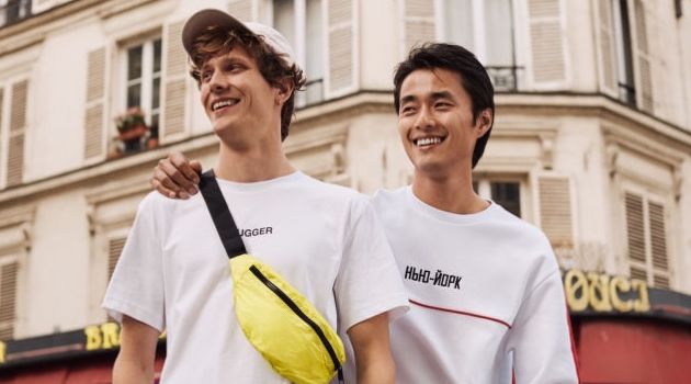 Models Felix Gesnouin and Zhao Lei sports fashions from H&M. Felix wears one of the brand's trendy belt bags.