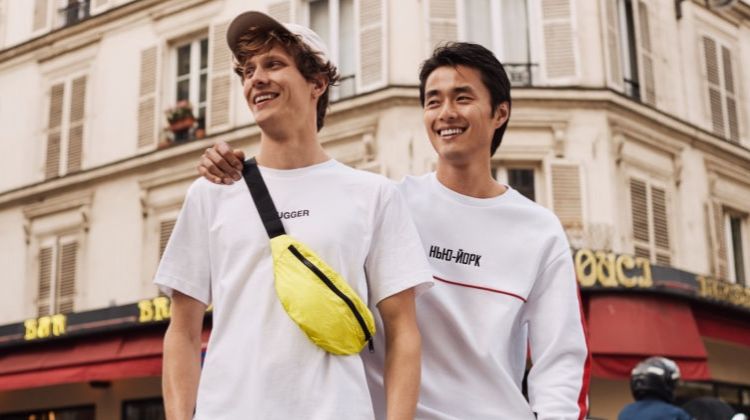 Models Felix Gesnouin and Zhao Lei sports fashions from H&M. Felix wears one of the brand's trendy belt bags.
