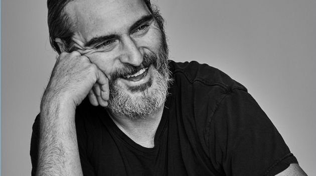 Actor Joaquin Phoenix sits for a black and white portrait.