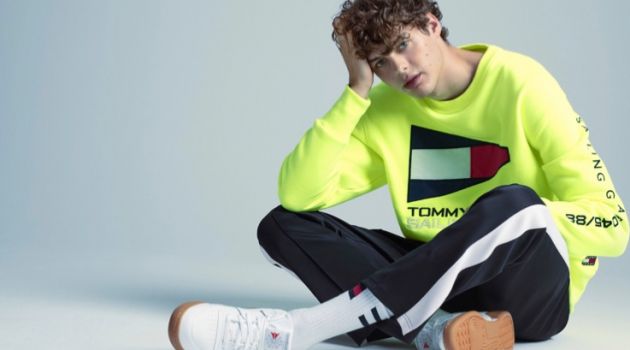 Front and center, Darwin Gray wears a look from Tommy Jeans.