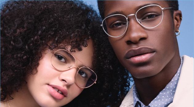 Pictured right, James Kakonge models Warby Parker Hawkins glasses in antique silver.