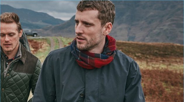 Sam Heughan and George Barnett wear pieces from Barbour's fall-winter 2018 tartan collection.