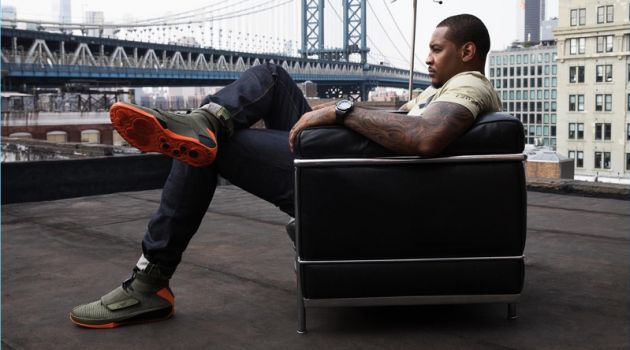 Carmelo Anthony wears the Carmelo Anthony x Rag & Bone AJXX sneaker, which features reflective materials.