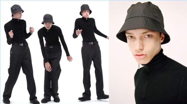 Dario Papić dons a Prada bucket hat, sneakers, wide-leg trousers, a mock-neck turtleneck, and belt.