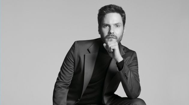 Donning a sharply tailored suit, Daniel Brühl fronts the BOSS Made in Germany capsule collection campaign.