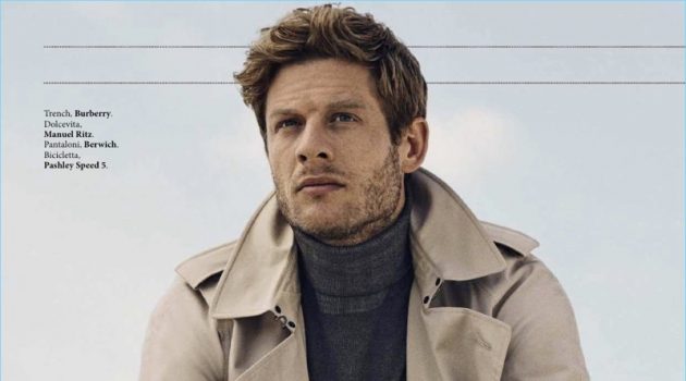 James Norton dons a Burberry trench with a Manuel Ritz turtleneck and Berwich trousers.