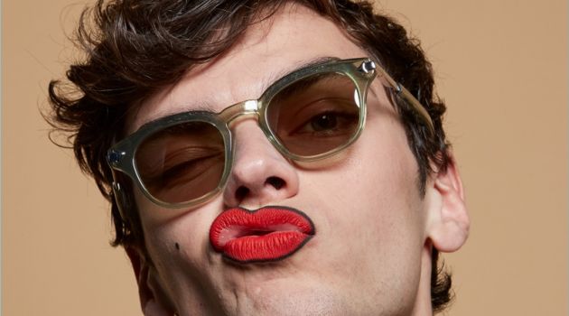 Making a silly face, Xander Weber wears Monumental by Karen Walker Klee Green sunglasses.