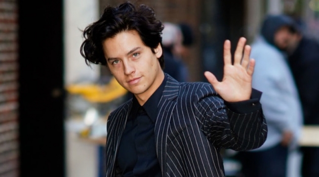 October 2018: Cole Sprouse wears a Versace pinstripe suit in New York City.