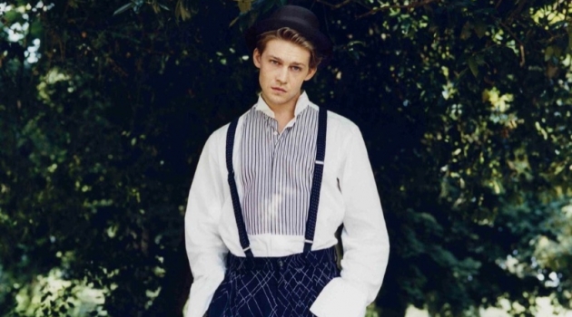 Joe Alwyn dons a Charvet shirt with Giorgio Armani trousers and a Lock & Co. Hatters hat.