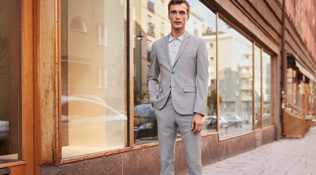 Clément Chabernaud sports a light grey skinny fit suit by H&M.