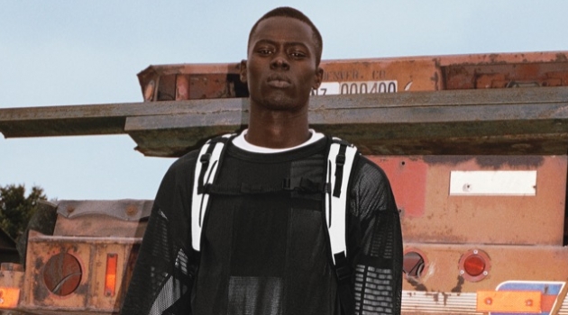 Alpha Dia models a black and white outfit for Y-3's spring-summer 2019 campaign.