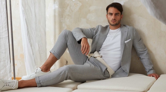 Aleksandar Rusić is a chic vision in a grey suit for Eleventy.