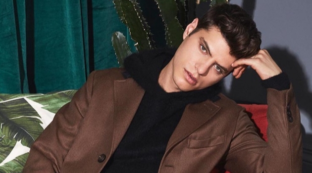 Antonino Russo showcases Valentine's Date inspiration with a single-breasted coat, brushed texture hoodie, and jeans from YOOX.