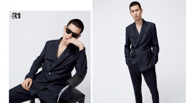 Dashing to say the least, Kohei Takabatake models a pinstripe anti-fit suit from LE 31.