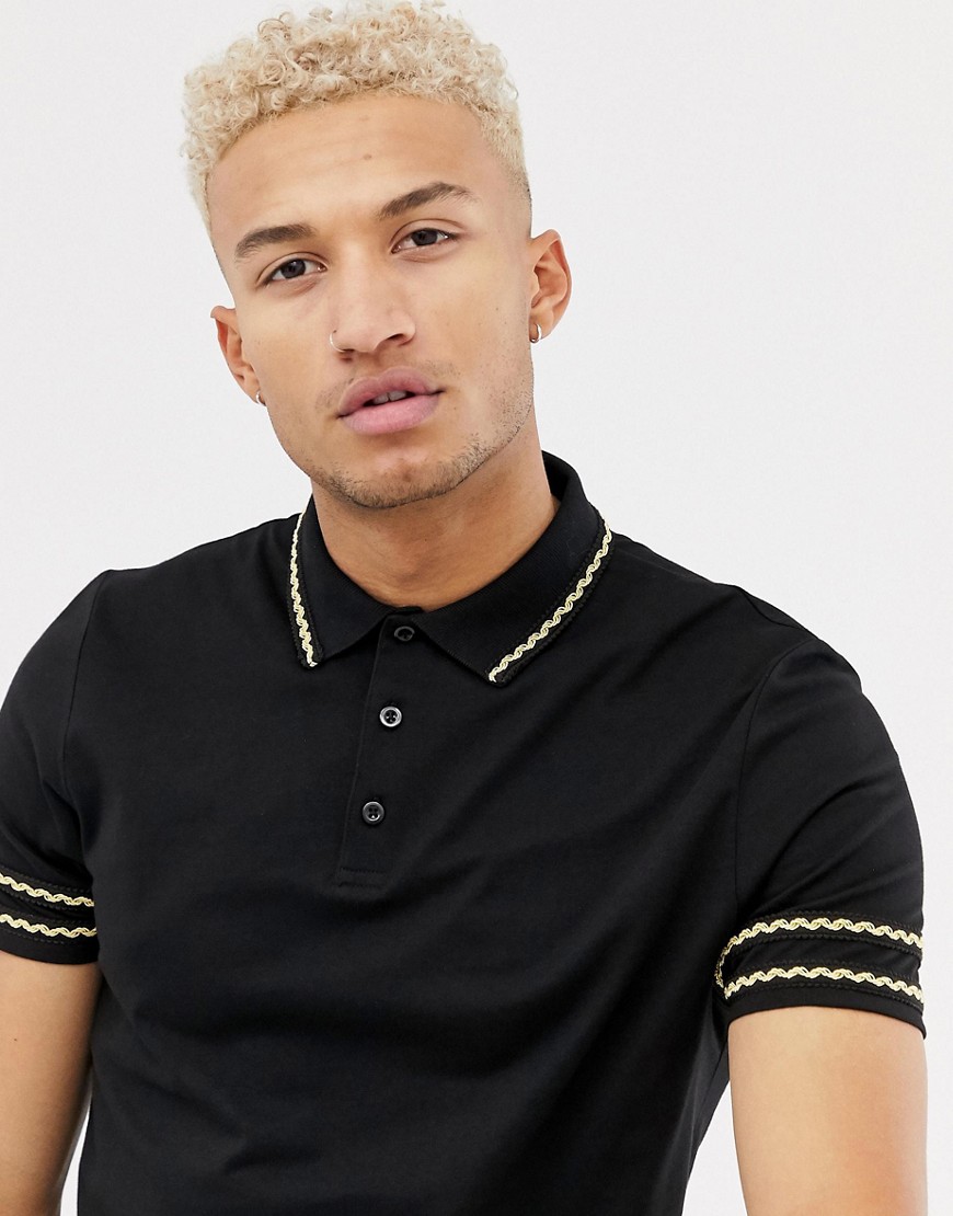 ASOS DESIGN polo shirt with contrast gold sleeve taping in black ...