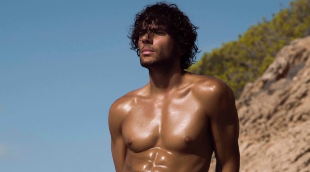 Azzaro Paris enlists model Matteo Cupelli as the star of its spring-summer 2019 swimwear campaign.