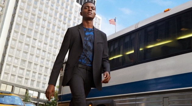 Donning a suit, Jubril Oyedeji appears in Kenneth Cole's spring-summer 2019 campaign.