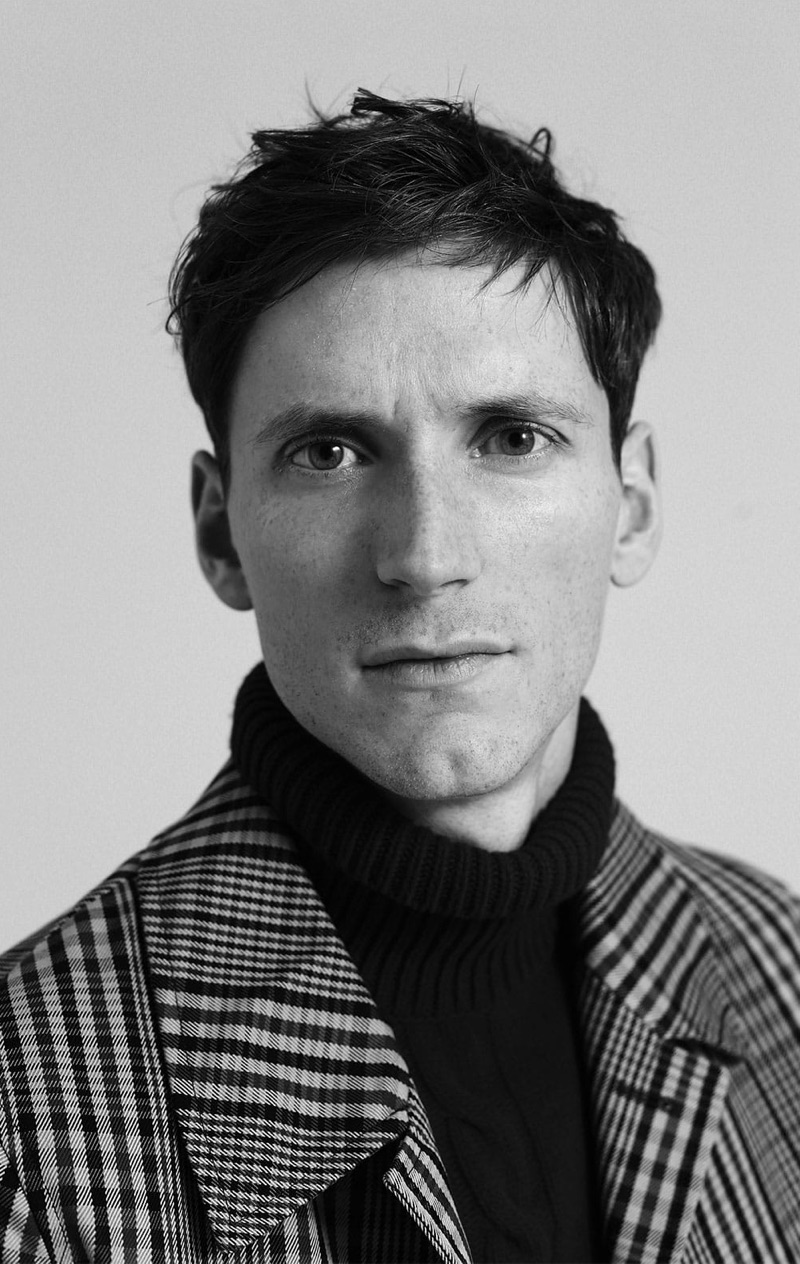 Ready for his close-up, Bastiaan Ninaber dons an Oliver Spencer sweater and Burberry overcoat. 