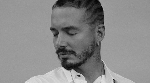 J Balvin connects with Numéro Russia for a new photo shoot feature. He wears a Hardcore Fashion shirt.