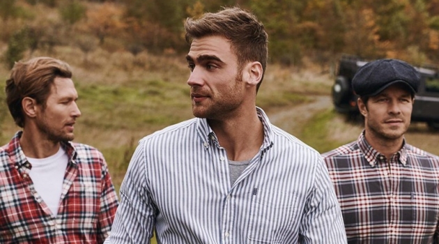 Robertas Aukstuolis, George Alsford, and Paul Sculfor wear tops from Barbour's fall 2019 Shirt Department collection.