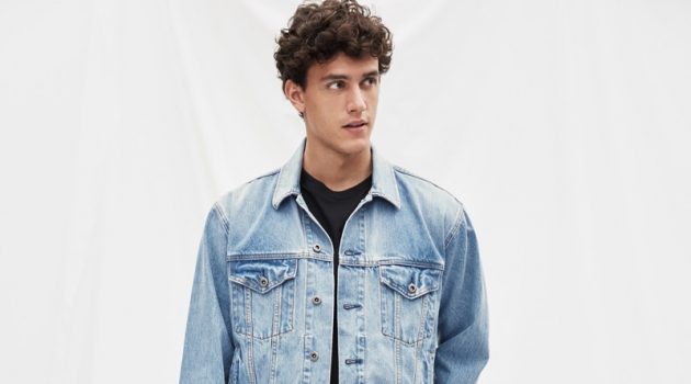 Xavier Serrano wears Gap's '90s Originals oversized Icon denim jacket $98 and easy fit jeans $69.95.