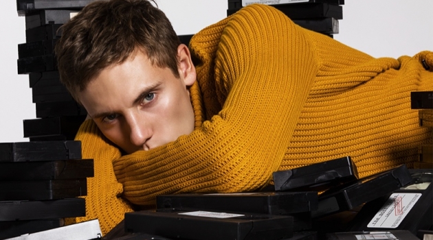 Embracing a pop of color, Anton wears a ribbed sweater from BOSS.