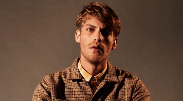 Front and center, Baptiste Radufe dons a checked overshirt with corduroy pants by Zara.