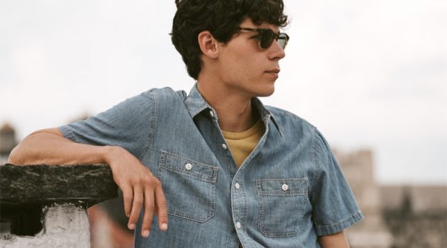 Going simple, Tyler Blue Golden rocks a Madewell chambray shirt and t-shirt with Oliver Peoples Finley Esquire sunglasses.