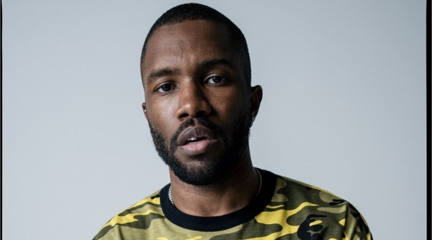 Front and center, Frank Ocean wears his own camouflage print t-shirt with a Louis Vuitton shorts skirt and vintage belt.