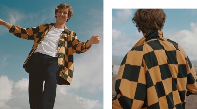 Sporting a checker print jacket, Felix Gesnouin stars in Esprit's fall 2019 campaign.