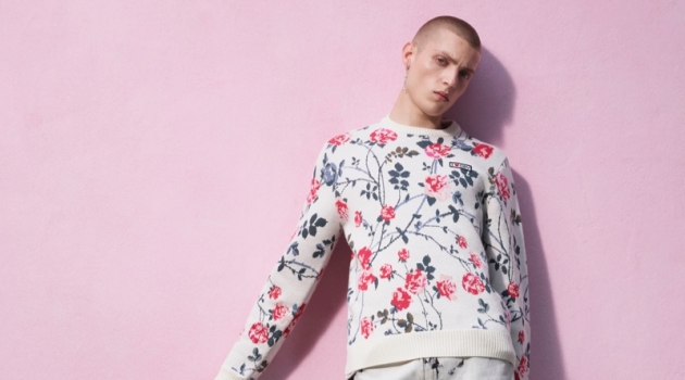 Tom Rey sports a floral print and bleach look from the Giambattista Valli x H&M collection.