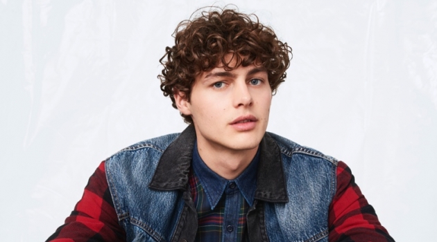 Darwin Gray sports a denim and buffalo check jacket with a plaid shirt from Levi's fall-winter 2019 collection.