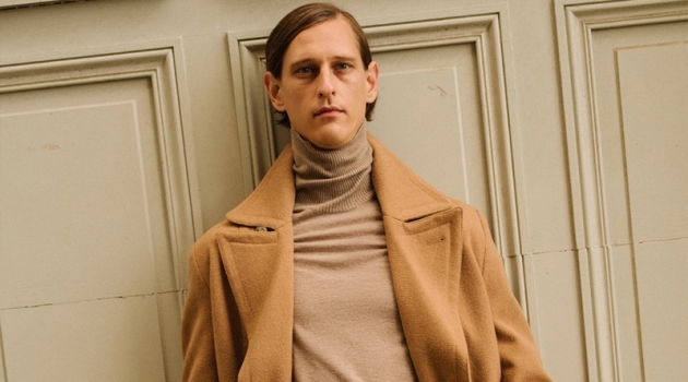 Making a case for monochromatic style, Rogier Bosschaart models a camel coat by Reserved.