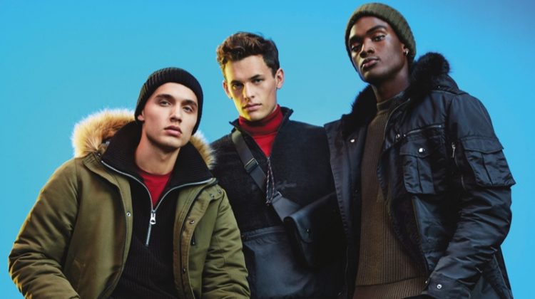 Models Dom Stowell, Maximilian Wefers, and Davidson Obennebo wear fashions from River Island's Electric Xmas collection.