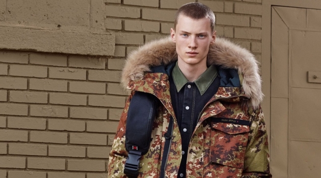 Braien Vaiksaar sports a digital camouflage print parka with denim from Zara SRPLS' fall-winter 2019 collection.