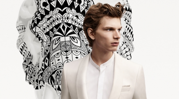 A sharp vision in a white evening look, Erik van GIls fronts the BOSS x Meissen holiday campaign.