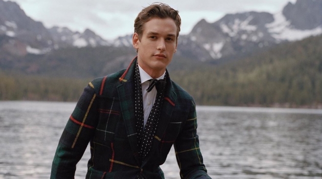 Jegor Venned dons a tartan blazer with velvet pants from POLO Ralph Lauren.