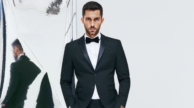 Tobias Sorensen dons a sleek tuxedo from Selected Homme.