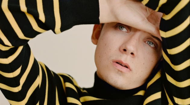 Donning a striped sweater by Stella McCartney, Asa Butterfield stars in a shoot for The Laterals.