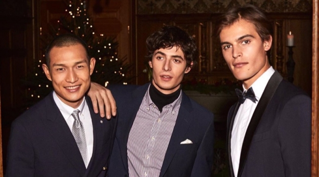 Models Zhang Wenhui, Oscar Kindelan, and Parker van Noord dress up for GANT's holiday 2019 campaign.