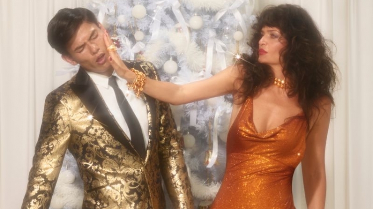 Slapping Simonas Pham, Helena Christensen makes an appearance in Versace's holiday 2019 campaign.