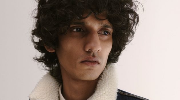 Sporting a denim trucker jacket, Mustafa Dawood models for Reserved.