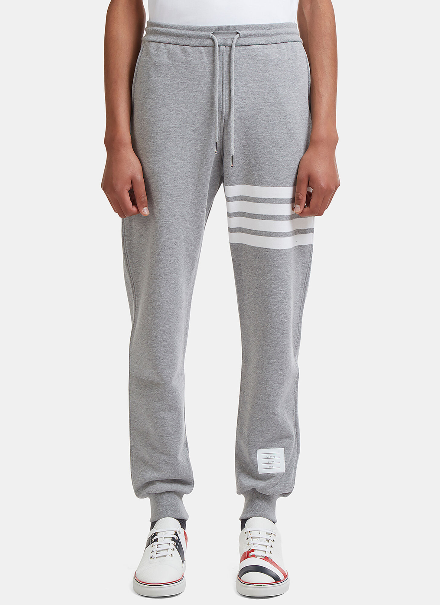 light grey track pants